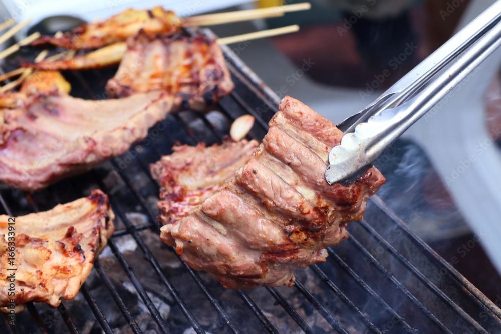 pork ribs on barbecue grill