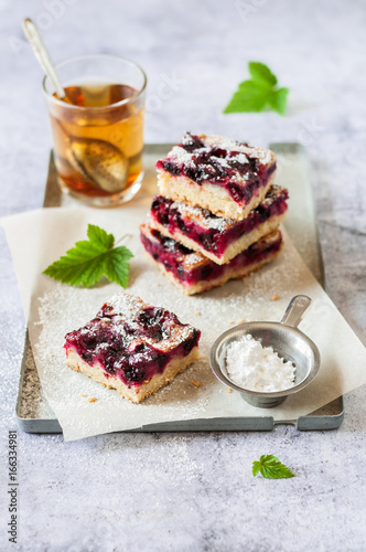 Black Currant Slice with a Glass of Tea