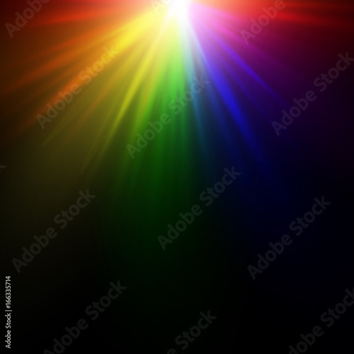 Bright rainbow glow on a black background. A multicolored explosion of paints. 