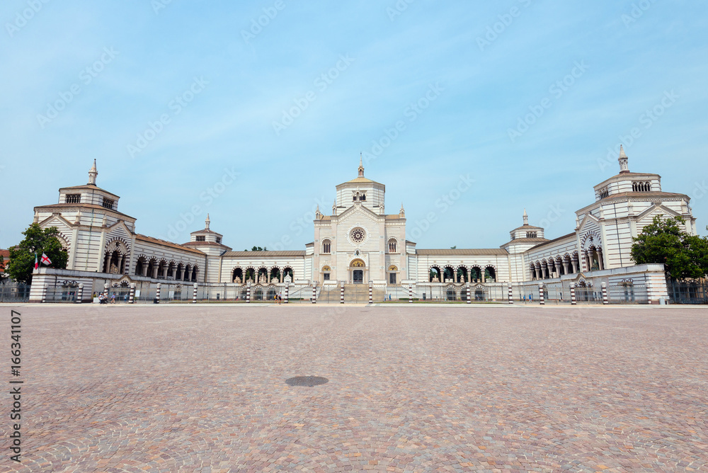 Naklejka premium Monumental Cemetery in Milano, Italy, also known as Cimitero Monumentale di Milano - one of the largest cemeteries and main landmarks in the city. Famedio chapel is main entrance to graveyard.