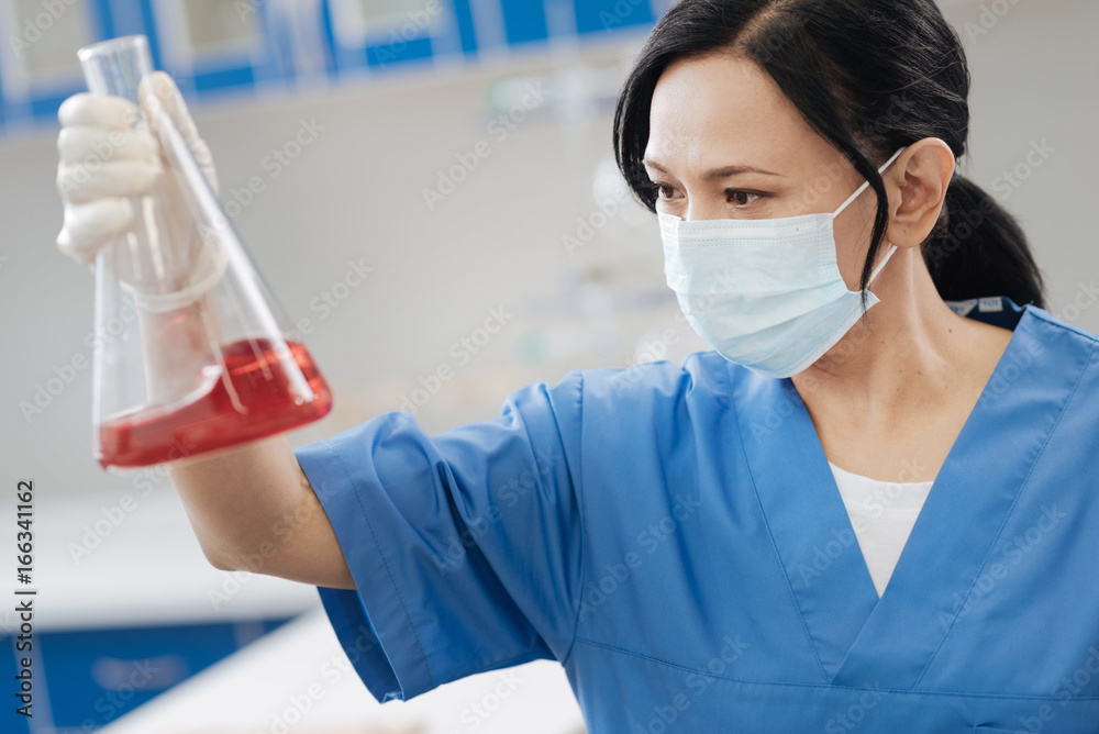 Intelligent professional chemist working in the lab Intelligent professional chemist working in the lab