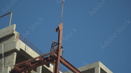 steeplejack workers on construction activities
