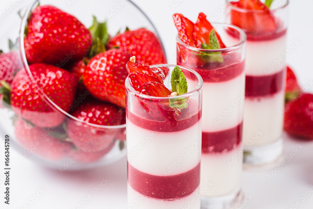 Strawberry Panna Cotta on a white background (close) Strawberry Panna Cotta on a white background (close)