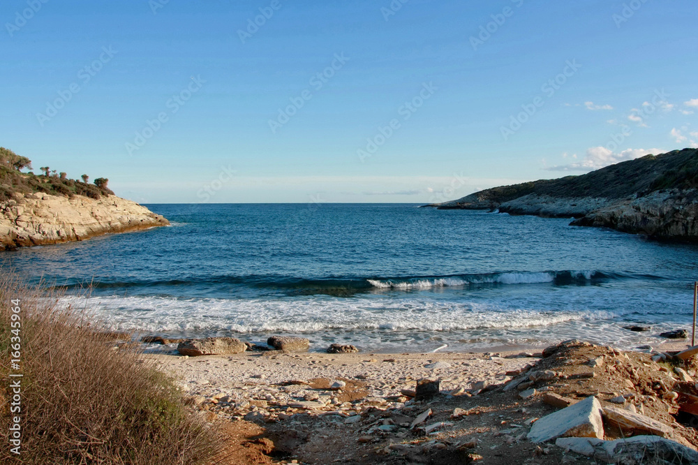 Little bay with blue water