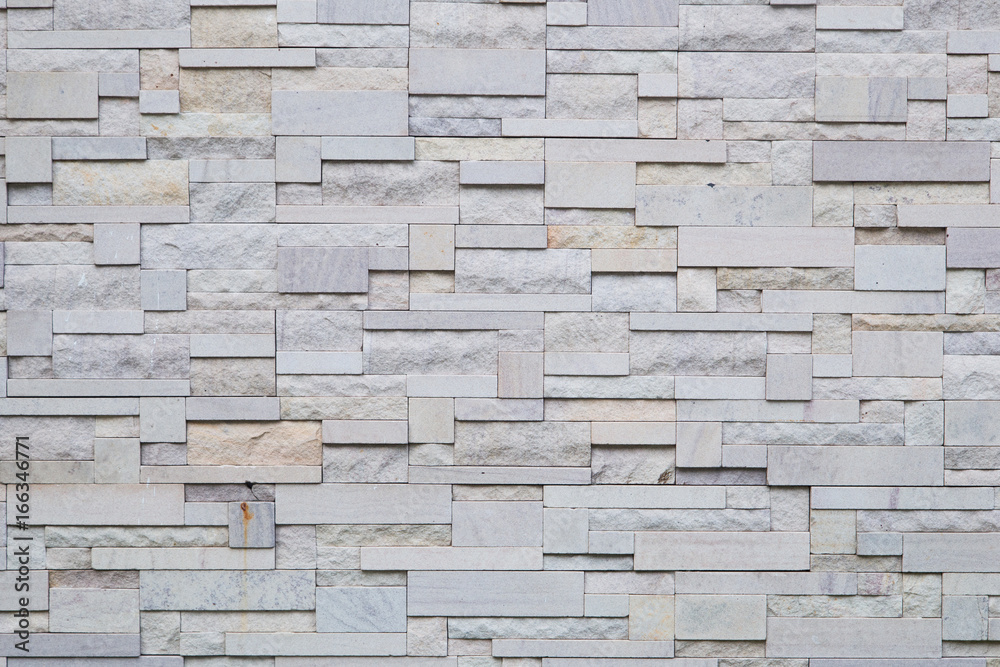Fototapeta premium pattern of decorative white slate stone wall surface