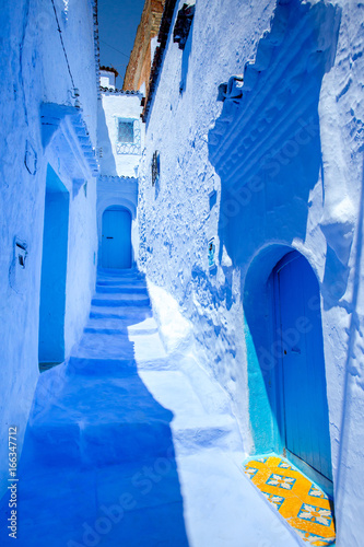 Street and building at Chefchaouen, the blue city in the Morocco. Old traditional town. Travel destination concept. Architectural decoration and design details. © Visual Intermezzo