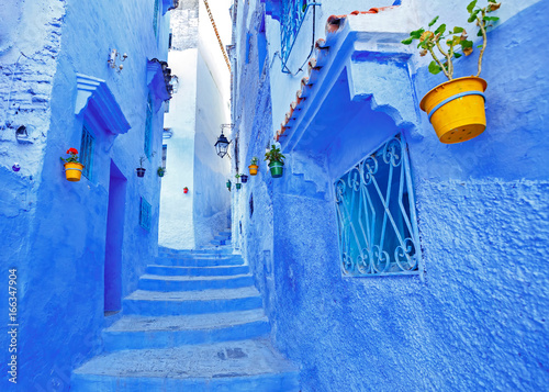 Street and building at Chefchaouen, the blue city in the Morocco. Old traditional town. Travel destination concept. Architectural decoration and design details. © Visual Intermezzo