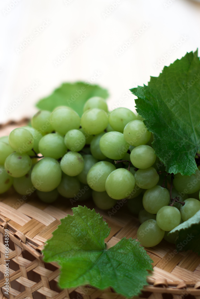 Grapes of grapes on a wooden table. Grapes of grapes on a wooden table.