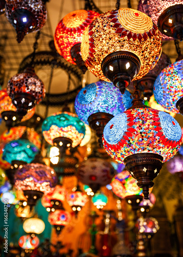 Colorful lanterns and lamps hanging in the market at Marrakesh, Morocco
