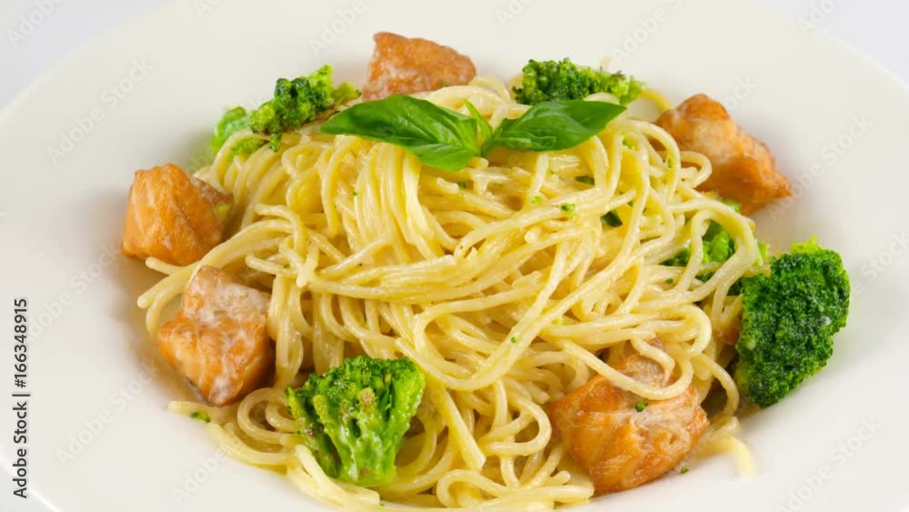 Pasta salmon with fried salmon and broccoli, loop, 4K, ProRes codec, 422 HQ, ISO 100 Pasta salmon with fried salmon and broccoli, loop, 4K, ProRes codec, 422 HQ, ISO 100