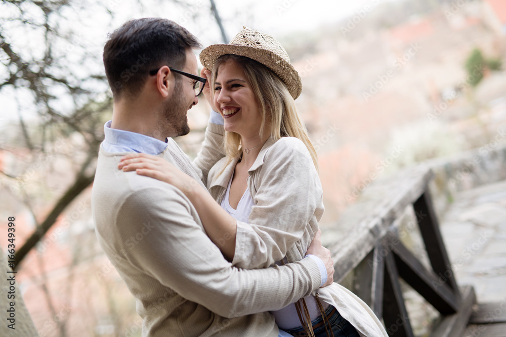 Fototapeta premium Happy couple in love hugging outdoor
