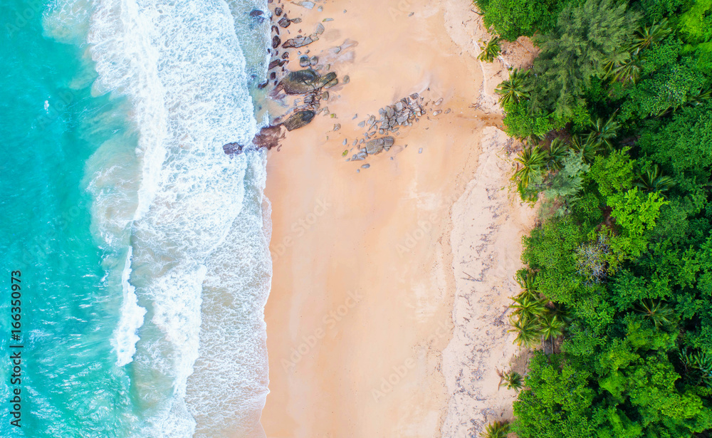 Sea aerial view,Top view,amazing nature background.The color of the water and beautifully bright.Azure beach with rocky mountains and clear water of Thailand ocean at sunny day.