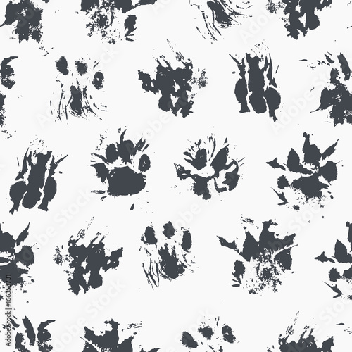 Abstract seamless pattern - black ink prints with messy cat paws.