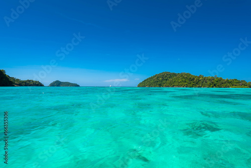Blue and bright sea water surface at the open sea  Beautiful blue sea at Surin island  Thailand