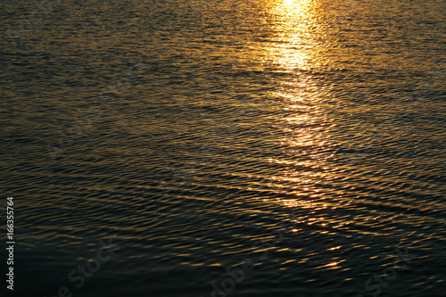 Background of the water surface at sunset