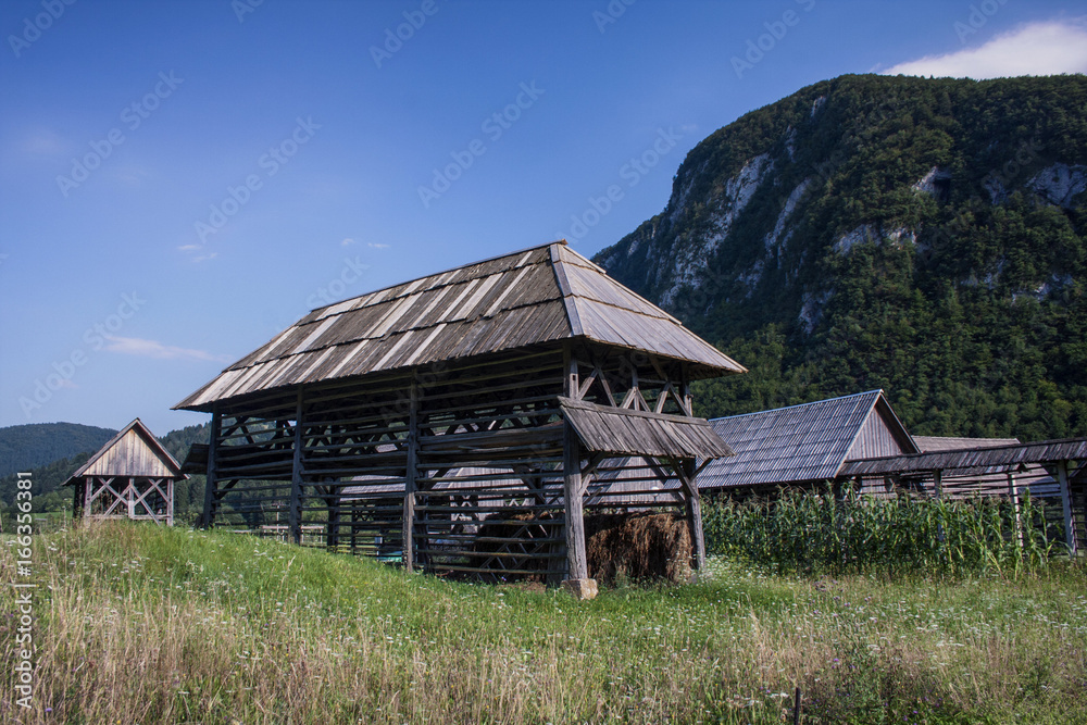 Traditional wooden double linked hayrack or toplarji at Studor, Slovenia