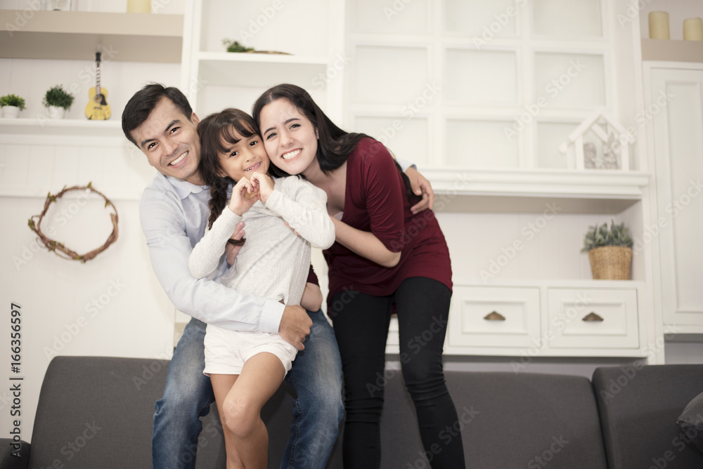 Happy family in happy mood, smiling together Happy family in happy mood, smiling together