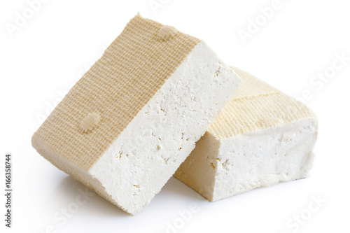 Two blocks of white tofu isolated on white.