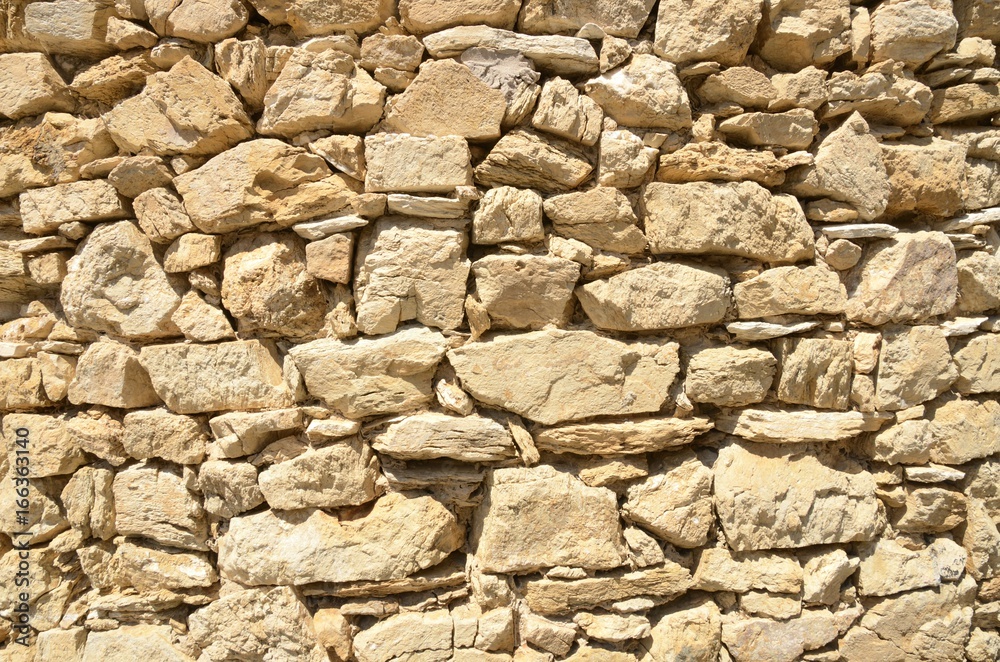 Medieval stones wall in Begur, Catalonia, Spain Medieval stones wall in Begur, Catalonia, Spain