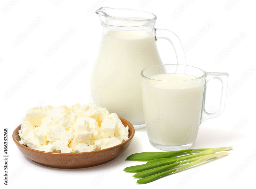 Glass jug pitcher of fresh milk with glass and cottage cheese isolated on white background carafe Glass jug pitcher of fresh milk with glass and cottage cheese isolated on white background carafe