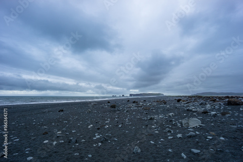 Iceland - Black stony sand beach of Vik in the evening