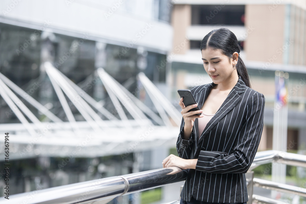 Fototapeta premium Business people looking to smartphone. People wolking for business project. Business people working concept.