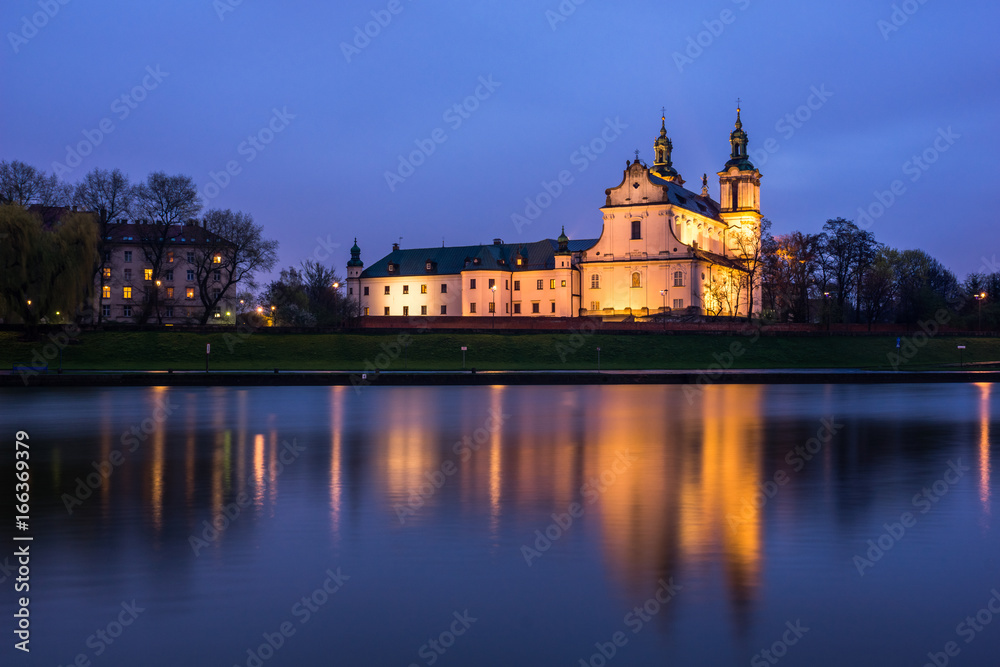 Night view on the church on the Rock and Vistula river in Cracow, Poland