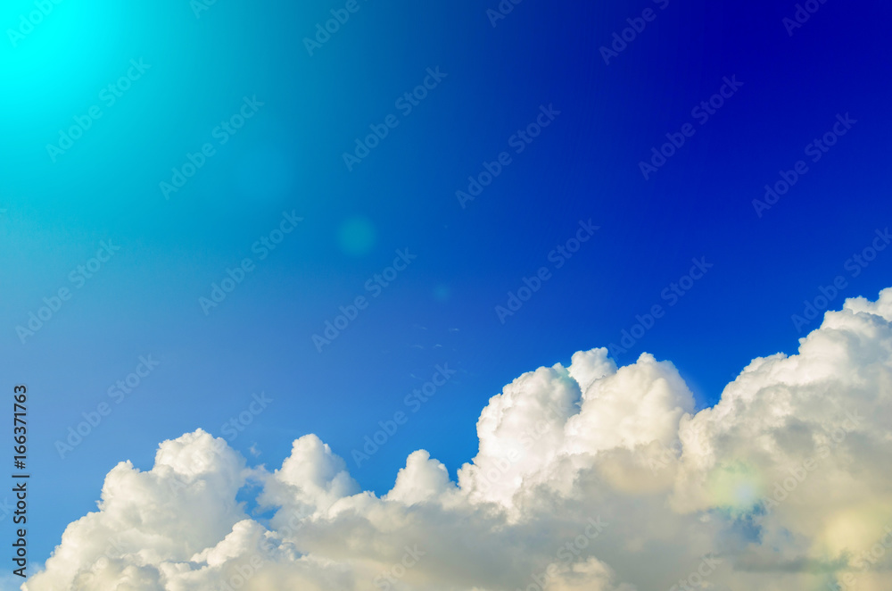 White Cumulus clouds against the blue sky White Cumulus clouds against the blue sky