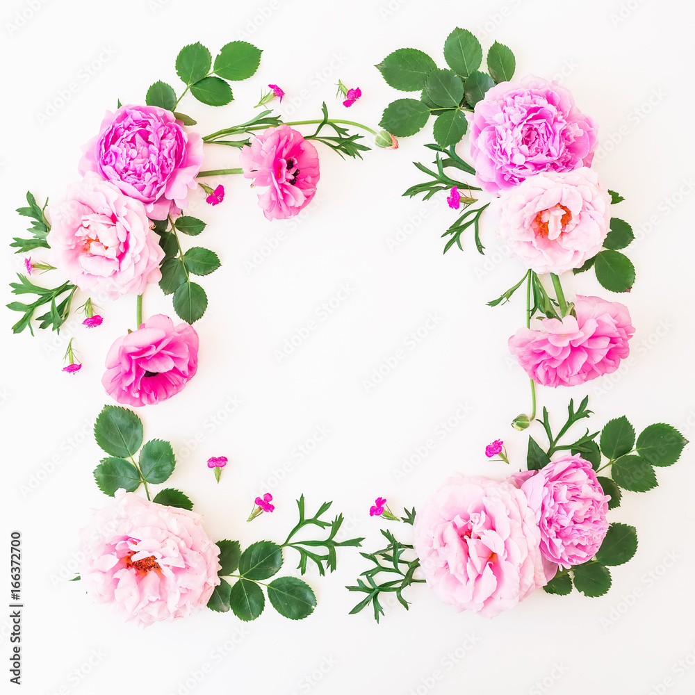 Floral frame made of pink flowers on white background. Floral composition. Flat lay, top view.