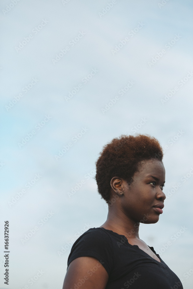 Young african woman serious and recovering after hard run workout - sweaty Young african woman serious and recovering after hard run workout - sweaty