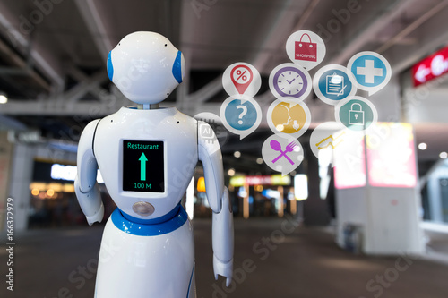 Smart retail , robot assistant , robo advisor navigation robot technology in department store and icons graphic. Robot walk lead to guide customer to destination target. photo