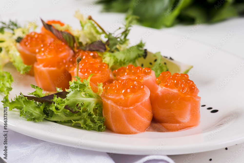  Roll of salmon on white boards