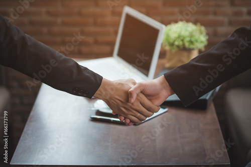 Businessmen shaking hands