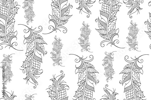 Seamless pattern with hand drawn feathers in mehndi style, vector. There is a swatch in the panel. Elements are not cut off and hidden under mask