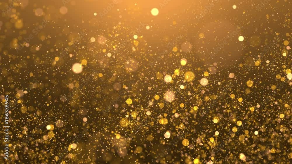 Glittering golden sparks flying in a blurred background. 4K UHD video loop animation.