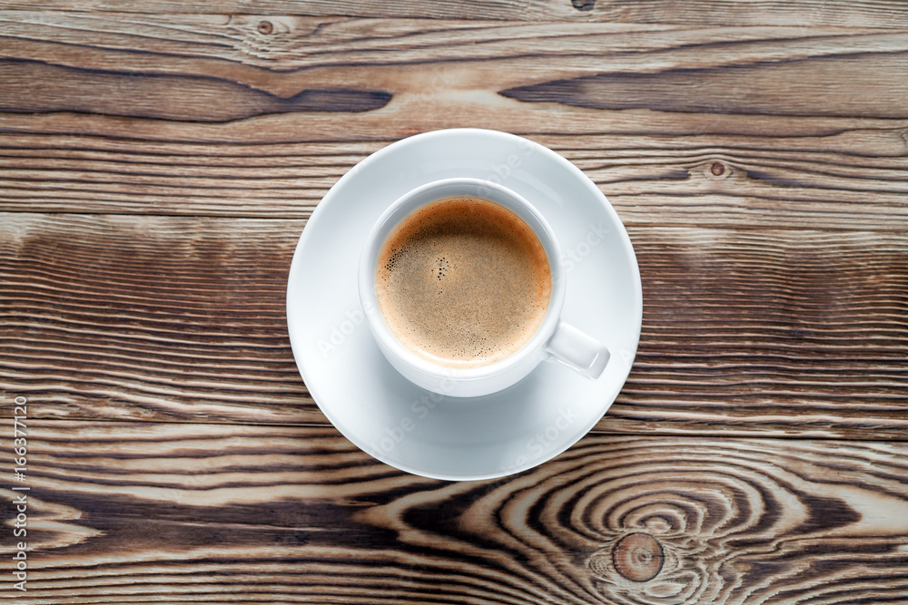 Coffee cup and cookie on wood Coffee cup and cookie on wood