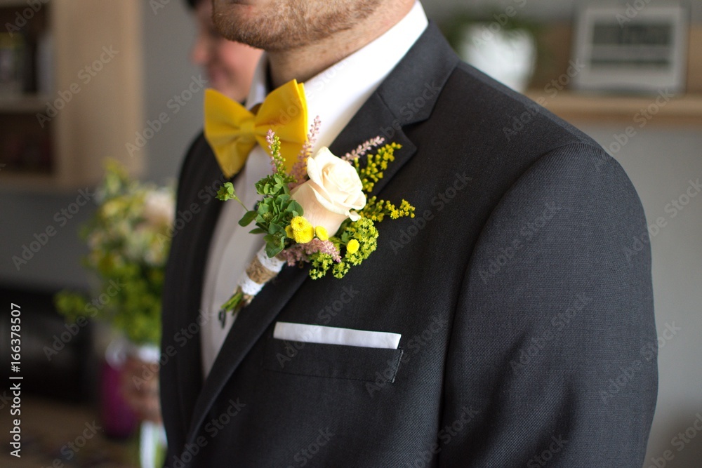 groom in suit with yellow bowtie Stock Photo Adobe Stock