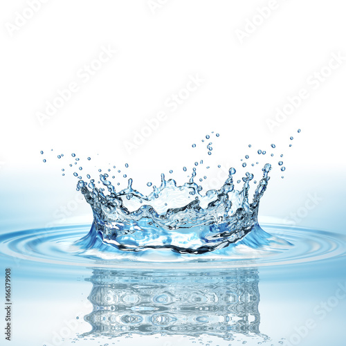 Water splash in dark blue color with a drop of water flying from above