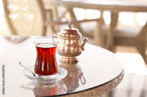 Turkish tea in traditional glass on table