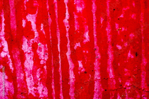 Old red paint on metal background, conrast photo