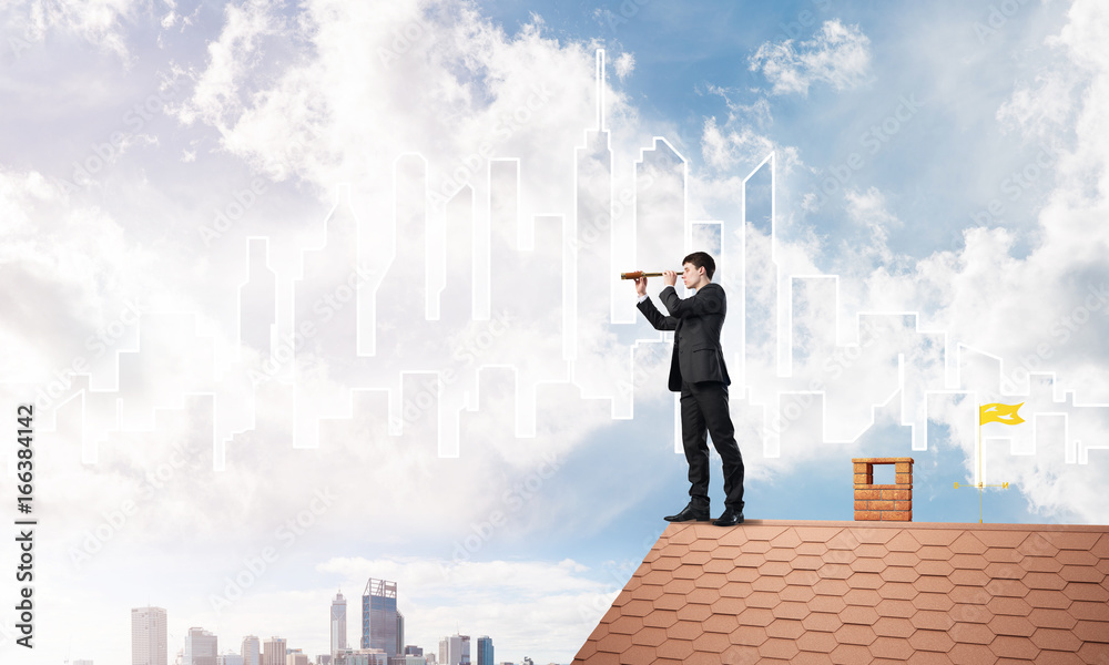 Engineer man standing on roof and looking in spyglass. Mixed media Engineer man standing on roof and looking in spyglass. Mixed media