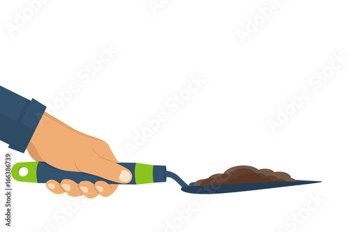 Garden shovel with soil hold in hand of gardener. Gardening, griculture, planting concept. Vector illustration flat design.Isolated on white background. Cultivating ground. Dig ground.  