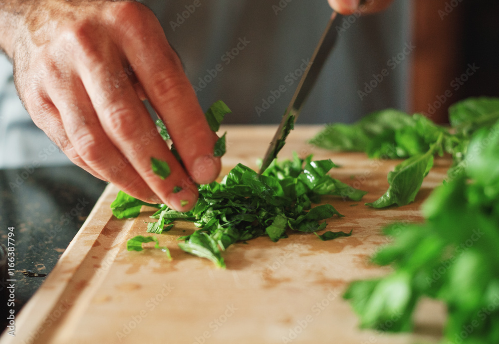 chopping basil chopping basil