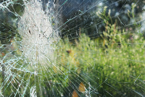 Vandals smashed the glass at a bus stop in the city