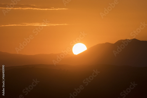 Summer sunset in Ventura County near Los Angeles in Southern California.  Shot from Rocky Peak Park above Simi Valley in the Santa Susana Mountains.   © trekandphoto