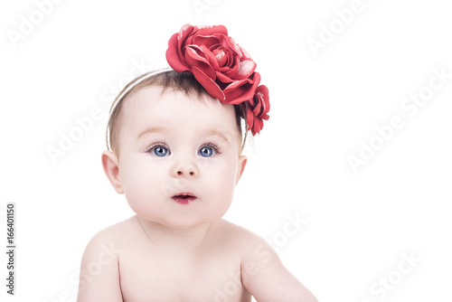 portrait of cute baby girl with flowers headband on her head, isolated on white background