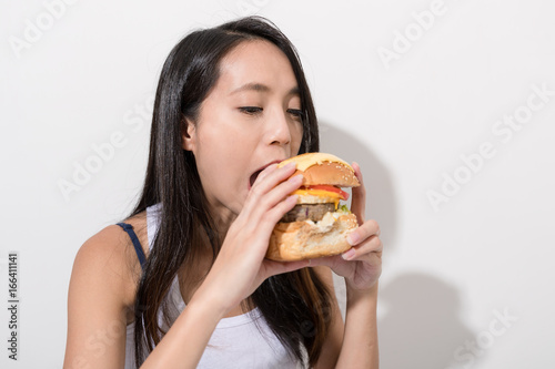 Woman eating burger