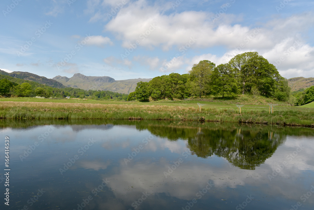 Langdale Pikes reflected in River Brathay, English Lake District