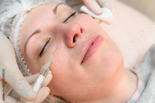 Injections for rejuvenation in cosmetology.