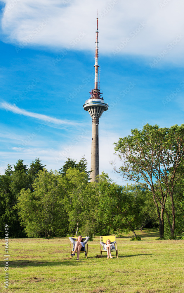 Obraz premium Family resting near Tallinn TV Tower.